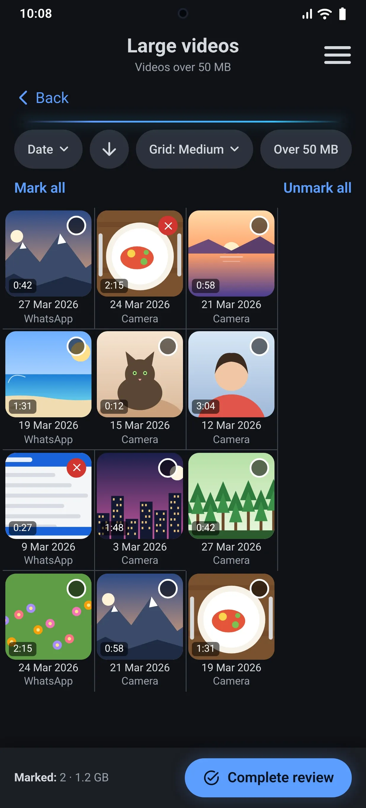 Large videos in a grid, with two videos marked for removal